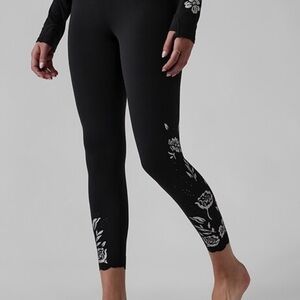 Athleta Black Leggings w/laser cut detail silver foil flowers Cropped Length